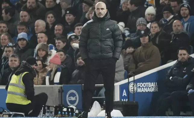 Chelsea's head coach Enzo Maresca stands during the English Premier League soccer match between Brighton and Chelsea in Brighton, England, Friday, Feb. 14, 2025. (AP Photo/Dave Shopland)