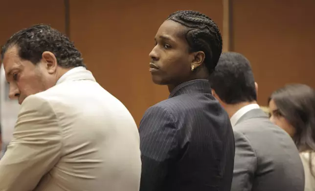 A$AP Rocky, center, waits for his verdict to be read during his trial Tuesday, Feb. 18, 2025, in Los Angeles. (Daniel Cole/Pool Photo via AP)
