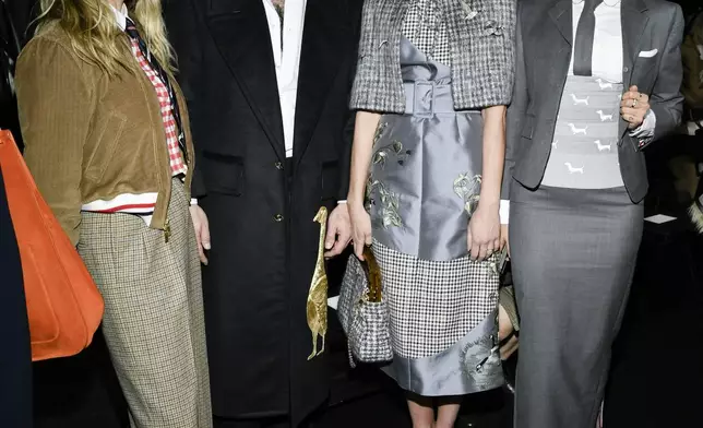 Cara Delevingne, from left, Morgan Spector, Rebecca Hall, and Eiza Gonzalez attend the Thom Browne Fall/Winter 2025 fashion show as part of New York Fashion Week on Tuesday, Feb. 11, 2025, at The Shed in New York. (Photo by Evan Agostini/Invision/AP)