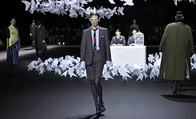 A model walks the runway during the Thom Browne Fall/Winter 2025 fashion show as part of New York Fashion Week on Tuesday, Feb. 11, 2025, at The Shed in New York. (Photo by Evan Agostini/Invision/AP)