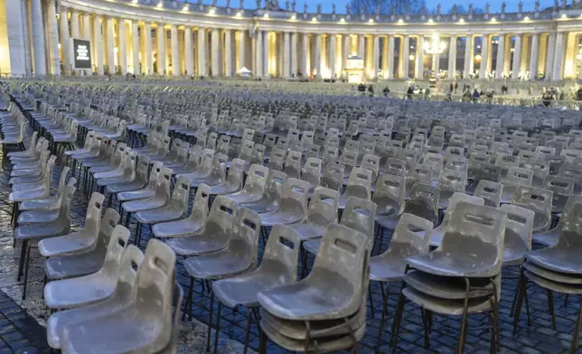 Chairs are prepared in St. Peter's Square at The Vatican, Monday, Feb. 24, 2025, ahead of a rosary vigil prayer for the health of Pope Francis who is in critical conditions at the Agostino Gemelli Polyclinic in Rome. (AP Photo/Mosa'ab Elshamy)