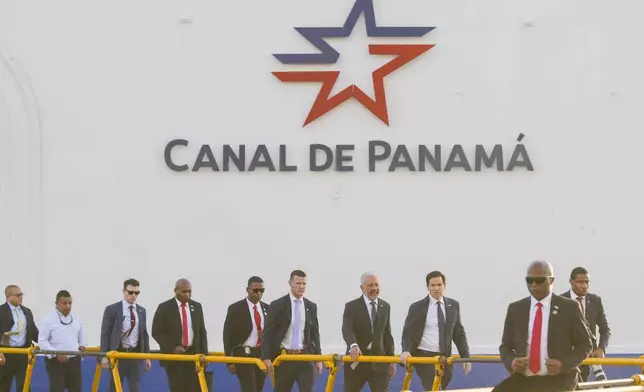 U.S. Secretary of State Marco Rubio, third from right, tours the Miraflores Locks at the Panama Canal in Panama City, Sunday, Feb. 2, 2025. (AP Photo/Mark Schiefelbein, Pool)