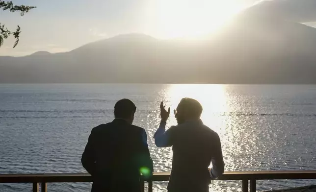 U.S. Secretary of State Marco Rubio, left, meets with President Nayib Bukele at his residence at Lake Coatepeque, El Salvador, Monday, Feb. 3, 2025. (AP Photo/Mark Schiefelbein, Pool)