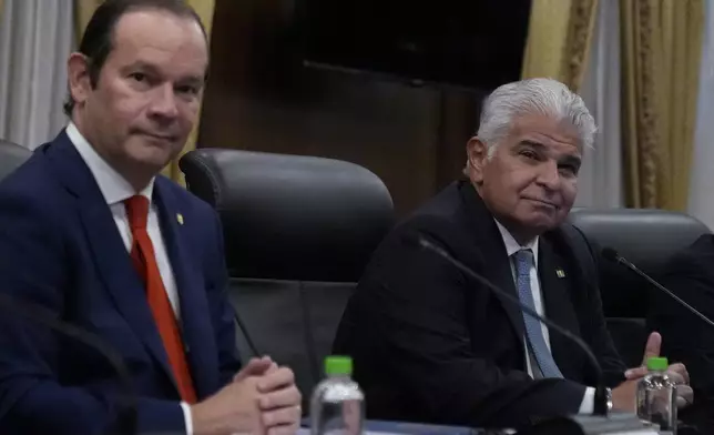 Panama's President Jose Mulino, right, and Foreign Minister Javier Martinez-Acha meet with U.S. Secretary of State Marco Rubio at the presidential palace in Panama City, Sunday, Feb. 2, 2025. (AP Photo/Mark Schiefelbein, Pool)
