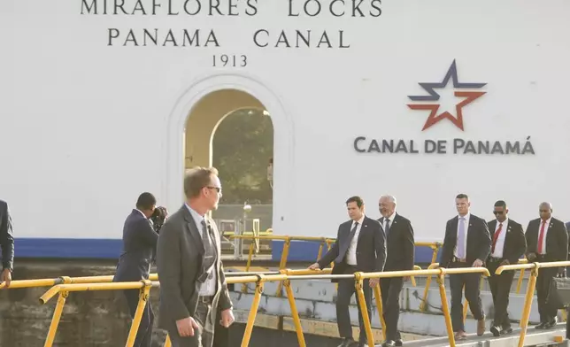 U.S. Secretary of State Marco Rubio tours the Miraflores Locks, guided by Panama Canal Authority Administrator Ricuarte Vásquez, fourth from right, in Panama City, Sunday, Feb. 2, 2025. (AP Photo/Mark Schiefelbein, Pool)