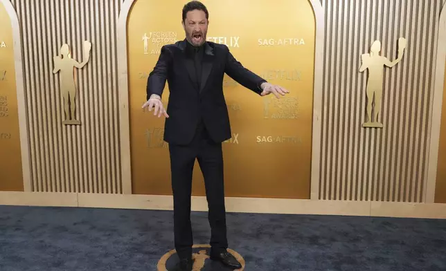Ebon Moss-Bachrach arrives at the 31st annual Screen Actors Guild Awards on Sunday, Feb. 23, 2025, at the Shrine Auditorium in Los Angeles. (Photo by Jordan Strauss/Invision/AP)
