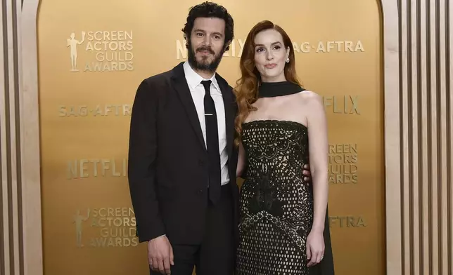 Adam Brody, left, and Leighton Meester arrive at the 31st annual Screen Actors Guild Awards on Sunday, Feb. 23, 2025, at the Shrine Auditorium in Los Angeles. (Photo by Richard Shotwell/Invision/AP)