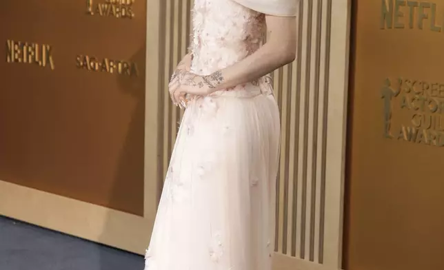 Ariana Grande arrives at the 31st annual Screen Actors Guild Awards on Sunday, Feb. 23, 2025, at the Shrine Auditorium in Los Angeles. (Photo by Jordan Strauss/Invision/AP)