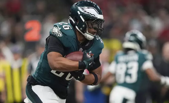 Philadelphia Eagles running back Saquon Barkley (26) carries during the second half of the NFL Super Bowl 59 football game against the Kansas City Chiefs, Sunday, Feb. 9, 2025, in New Orleans. (AP Photo/Matt Slocum)