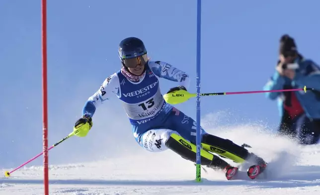 United States' Paula Moltzan competes in a women's slalom, at the Alpine Ski World Championships, in Saalbach-Hinterglemm, Austria, Saturday, Feb. 15, 2025. (AP Photo/Giovanni Auletta)