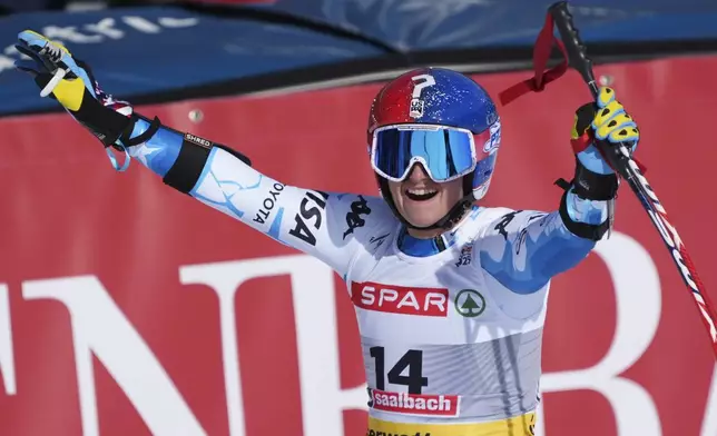United States' Lauren Macuga celebrates at the finish area of a women's Super-G, at the Alpine Ski World Championships, in Saalbach-Hinterglemm, Austria, Thursday, Feb. 6, 2025. (AP Photo/Giovanni Auletta)