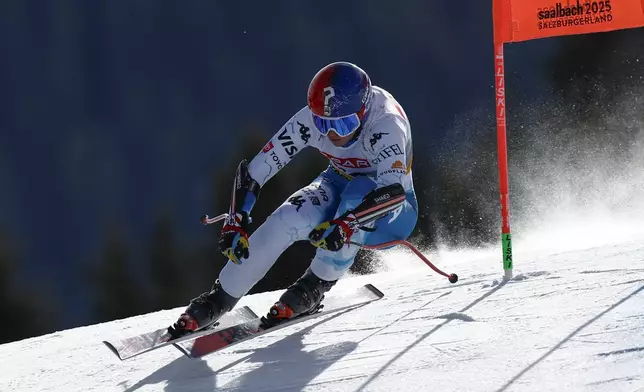 United States' Lauren Macuga speeds down the course during a women's Super-G, at the Alpine Ski World Championships, in Saalbach-Hinterglemm, Austria, Thursday, Feb. 6, 2025. (AP Photo/Gabriele Facciotti)