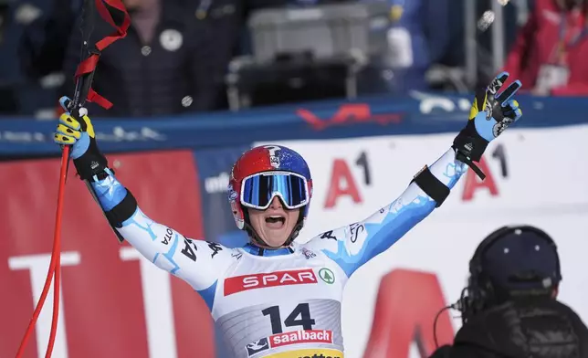 United States' Lauren Macuga celebrates at the finish area of a women's Super-G, at the Alpine Ski World Championships, in Saalbach-Hinterglemm, Austria, Thursday, Feb. 6, 2025. (AP Photo/Giovanni Auletta)