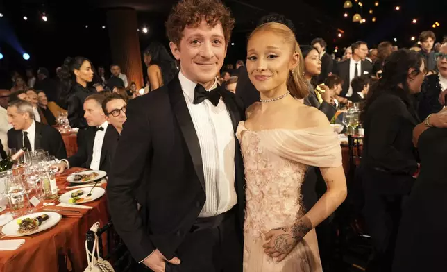 Ethan Slater, left, and Ariana Grande in the audience during the 31st annual Screen Actors Guild Awards on Sunday, Feb. 23, 2025, at the Shrine Auditorium in Los Angeles. (AP Photo/Chris Pizzello)