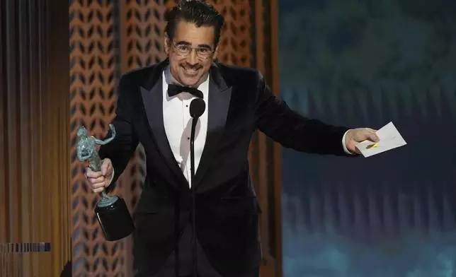 Colin Farrell accepts the award for outstanding performance by a male actor in a television movie or limited series for "The Penguin" during the 31st annual Screen Actors Guild Awards on Sunday, Feb. 23, 2025, at the Shrine Auditorium in Los Angeles. (AP Photo/Chris Pizzello)