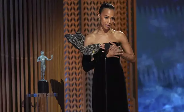 Zoe Saldana accepts the award for outstanding performance by a female actor in a supporting role in a motion picture for "Emilia Perez" during the 31st annual Screen Actors Guild Awards on Sunday, Feb. 23, 2025, at the Shrine Auditorium in Los Angeles. (AP Photo/Chris Pizzello)