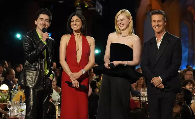 Timothee Chalamet, from left, Monica Barbaro, Elle Fanning, and Edward Norton speak about "A Complete Unknown" during the 31st annual Screen Actors Guild Awards on Sunday, Feb. 23, 2025, at the Shrine Auditorium in Los Angeles. (AP Photo/Chris Pizzello)