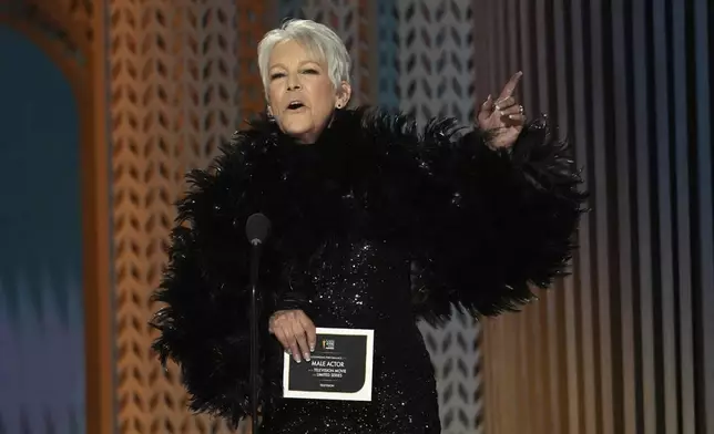 Jamie Lee Curtis presents the award for outstanding performance by a male actor in a television movie or limited series during the 31st annual Screen Actors Guild Awards on Sunday, Feb. 23, 2025, at the Shrine Auditorium in Los Angeles. (AP Photo/Chris Pizzello)