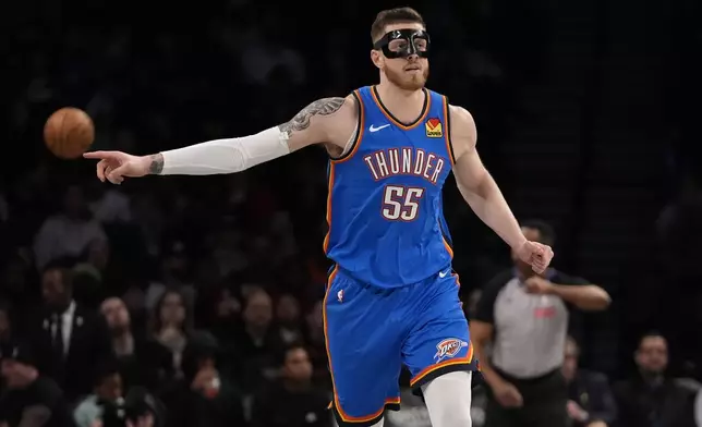Oklahoma City Thunder's Isaiah Hartenstein (55) gestures to teammates during the first half of an NBA basketball game against the Brooklyn Nets Wednesday, Feb. 26, 2025, in New York. (AP Photo/Frank Franklin II)