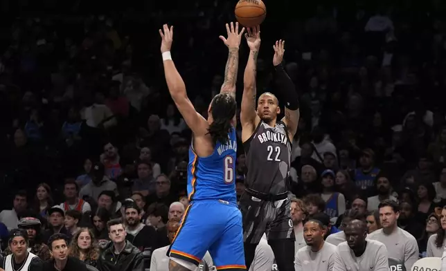 Brooklyn Nets' Jalen Wilson (22) shoots over Oklahoma City Thunder's Jaylin Williams (6) during the first half of an NBA basketball game Wednesday, Feb. 26, 2025, in New York. (AP Photo/Frank Franklin II)