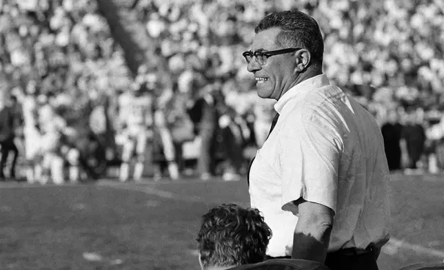 FILE_ Green Bay Packers coach Vince Lombardi cheers on his champion team as they swamp the Kansas City Chiefs during Super Bowl I in Los Angeles, Calif., Jan. 15, 1967. (AP Photo/File)