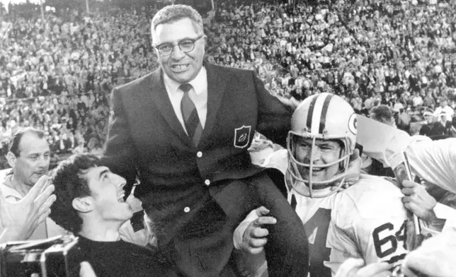 FILE - In this Jan. 14, 1968 photo, Green Bay Packers coach Vince Lombardi is carried off the field after his team defeated the Oakland Raiders 33-14 in Super Bowl II in Miami, Fla. (AP Photo/File)