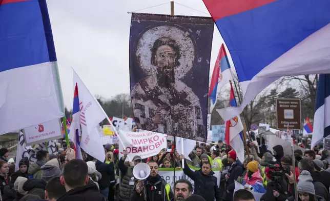 People attend a protest triggered after a concrete canopy on a railway station in the northern city of Novi Sad collapsed on Nov. 1, 2024 killed 15 people, in Kragujevac, Serbia, Saturday, Feb. 15, 2025. (AP Photo/Darko Vojinovic)