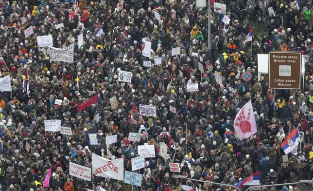 People attend a protest triggered after a concrete canopy on a railway station in the northern city of Novi Sad collapsed on Nov. 1, 2024 killed 15 people, in Kragujevac, Serbia, Saturday, Feb. 15, 2025. (AP Photo/Marko Drobnjakovic)