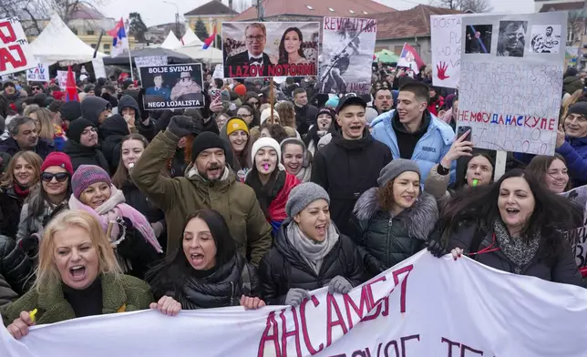 People attend a protest triggered after a concrete canopy on a railway station in the northern city of Novi Sad collapsed on Nov. 1, 2024 killed 15 people, in Kragujevac, Serbia, Saturday, Feb. 15, 2025. (AP Photo/Darko Vojinovic)