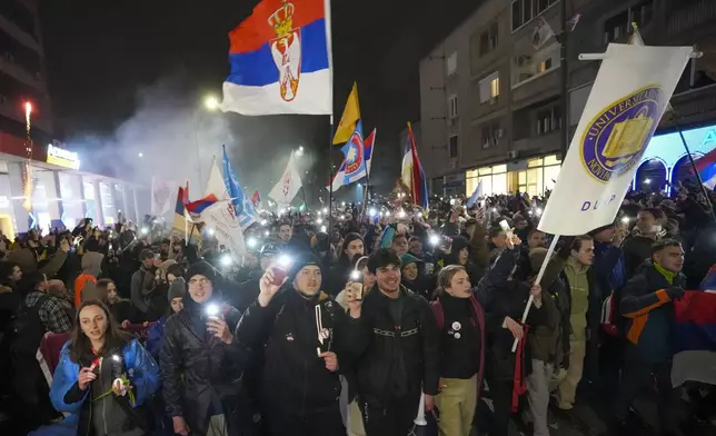 Students arrive in the Serbian industrial town of Kragujevac, to protest the deaths of 15 people killed in the November collapse of a train station canopy, Friday, Feb. 14, 2025. (AP Photo/Darko Vojinovic)