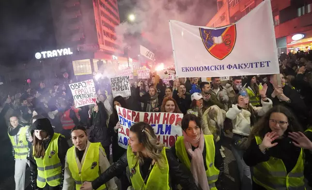 Students arrive in the Serbian industrial town of Kragujevac, to protest the deaths of 15 people killed in the November collapse of a train station canopy, Friday, Feb. 14, 2025. (AP Photo/Darko Vojinovic)
