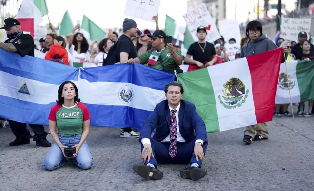 CORRECTS NAME OF THE FREEWAY - Demonstrators shut down the 101 freeway during a protest calling for immigration reform Sunday, Feb. 2, 2025, in Los Angeles. (AP Photo/Eric Thayer)