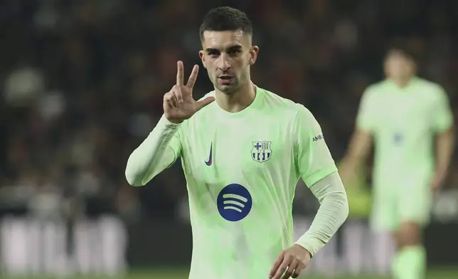 Barcelona's Ferran Torres celebrates his side's fourth goal during a Spanish Copa del Rey, or King's Cup, quarter-final soccer match between Valencia and Barcelona at the Mestalla Stadium in Valencia, Spain, Thursday Feb. 6, 2025. (AP Photo/Alberto Saiz)