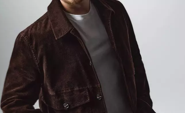 Dylan Sprouse in loose carpenter jeans, Perfect Pima Cotton Tee and corduroy jacket. (Photo: Business Wire)