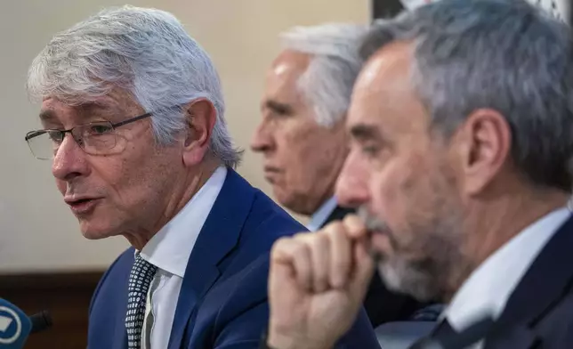 From left, Italian MInister of Sports Andrea Bodi, Milano Cortina 2026 Foundation President Giovanni Malago and Foundation CEO Andrea Vernier attend a press conference at the Foreign Press Club in Rome, Tuesday, Feb. 18, 2025, on the next Winter Olympic Games that will start in Italy in February 2026. (AP Photo/Domenico Stinellis)