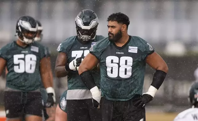 Philadelphia Eagles offensive tackle Jordan Mailata (68) warms up during an NFL football practice Thursday, Feb. 6, 2025, in New Orleans, ahead of Super Bowl 59 against the Kansas City Chiefs. (AP Photo/Gerald Herbert)