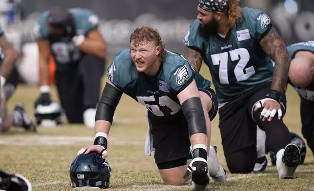 Philadelphia Eagles center Cam Jurgens (51) warms up during an NFL football practice Friday, Feb. 7, 2025, in New Orleans, ahead of Super Bowl 59 against the Kansas City Chiefs. (AP Photo/Gerald Herbert)