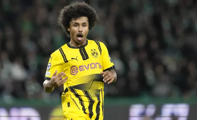 Dortmund's Karim Adeyemi during the Champions League playoff first leg soccer match between Sporting CP and Borussia Dortmund at the Alvalade stadium in Lisbon, Portugal, Tuesday, Feb. 11, 2025. (AP Photo/Armando Franca)