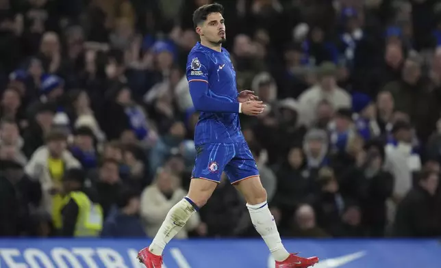 Chelsea's Pedro Neto celebrates after scoring his side's opening goal during the English Premier League soccer match between Chelsea and West Ham United at Stamford Bridge stadium in London, Monday, Feb. 3, 2025. (AP Photo/Kirsty Wigglesworth)