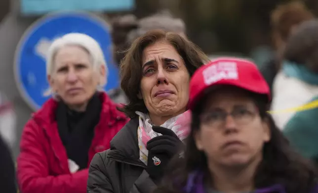 Relatives and supporters of hostages held by Hamas in the Gaza Strip protest outside the prime minister's office in Jerusalem on Tuesday, Feb. 11, 2025. after Hamas announced it would delay a planned hostage release after accusing Israel of violating a fragile ceasefire. (AP Photo/Ohad Zwigenberg)
