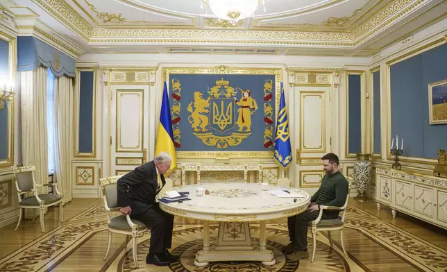 U.S. Special Envoy for Ukraine and Russia Keith Kellogg, left, and Ukraine's President Volodymyr Zelenskyy attend their meeting in Kyiv, Ukraine, Feb. 20, 2025. (AP Photo/Evgeniy Maloletka)