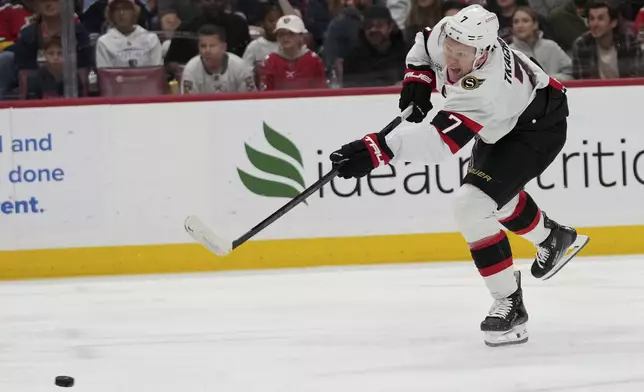 Ottawa Senators left wing Brady Tkachuk (7) attempts a shot on the goal during the first period of an NHL hockey game against the Florida Panthers Saturday, Feb. 8, 2025, in Sunrise, Fla. (AP Photo/Lynne Sladky)