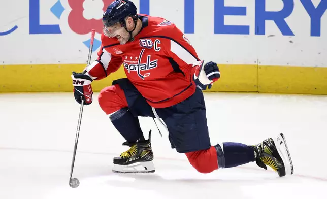 Washington Capitals left wing Alex Ovechkin celebrates his goal during the third period of an NHL hockey game against the Calgary Flames, Tuesday, Feb. 25, 2025, in Washington. (AP Photo/Nick Wass)