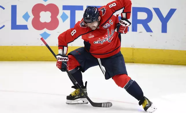 Washington Capitals left wing Alex Ovechkin celebrates his goal during the third period of an NHL hockey game against the Calgary Flames, Tuesday, Feb. 25, 2025, in Washington. (AP Photo/Nick Wass)