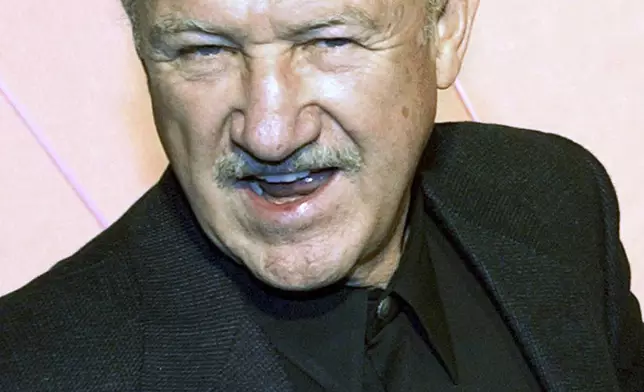 FILE - "The Royal Tenenbaums" cast member Gene Hackman poses at the premiere of the film in the Hollywood section of Los Angeles, Dec. 6, 2001. (AP Photo/Chris Pizzello, File)
