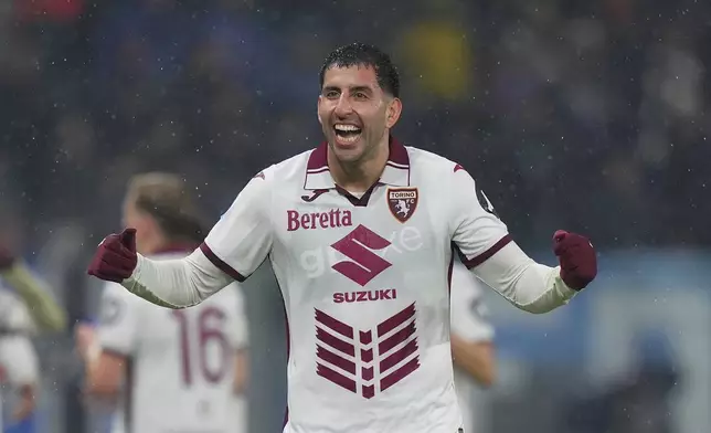 Torino's Guillermo Maripan celebrates after scoring during the Serie A soccer match between Atalanta and Torino at the Gewiss Stadium in Bergamo, Italy, Saturday Feb.1, 2025 . (Spada/LaPresse via AP)