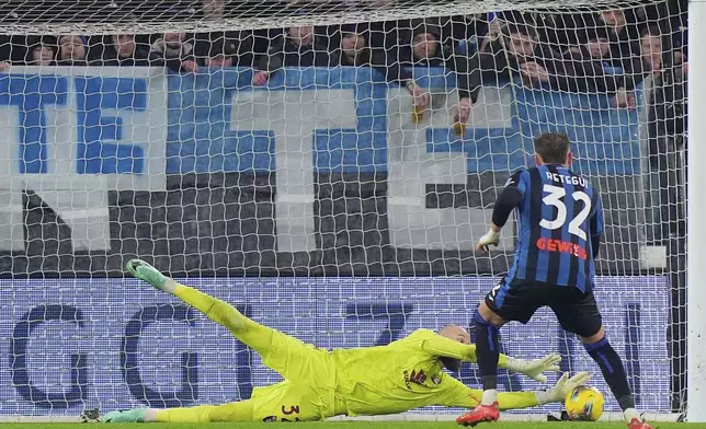 Torino goalkeeper Vanja Milinkovic-Savic saves a penalty kicked by Atalanta's Mateo Retegui during the Serie A soccer match between Atalanta and Torino at the Gewiss Stadium in Bergamo, Italy, Saturday Feb.1, 2025 . (Spada/LaPresse via AP)