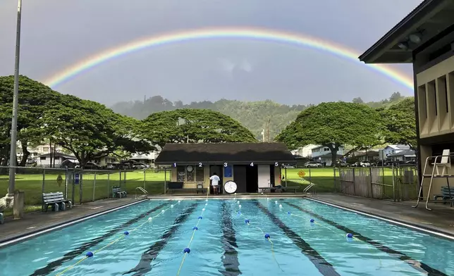 CORRECTS DATE A rainbow appears in the sky on Sept. 24, 2021, in Honolulu. (AP Photo/Jennifer Sinco Kelleher)