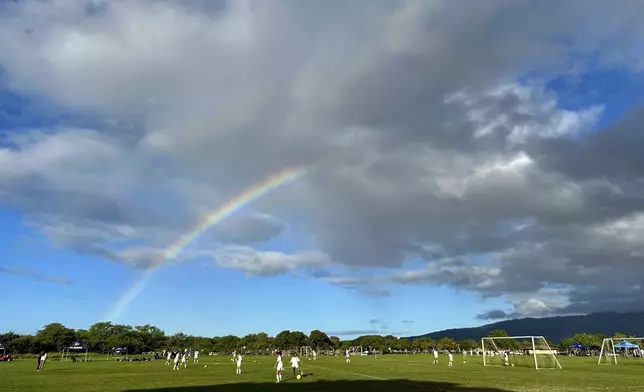 CORRECTS DATE A rainbow appears over a soccer field on Sept. 7, 2024, in Waipahu, Hawaii. (AP Photo/Jennifer Sinco Kelleher)