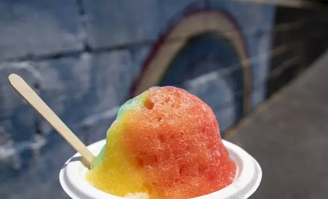 Rainbow Shave Ice is seen at Waiola Shave Ice, Thursday, Aug. 22, 2024, in Honolulu, Hawaii. (AP Photo/Mengshin Lin)